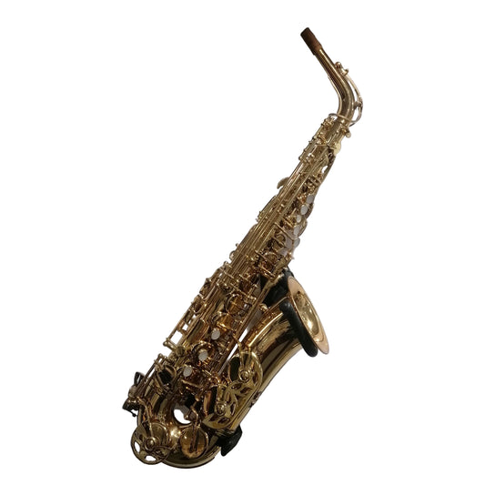 Gold saxophone on a gray slatted background