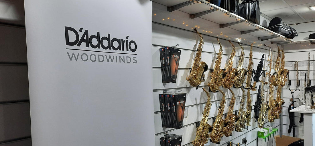 D'Addario Woodwinds logo with saxophones