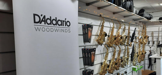 D'Addario Woodwinds logo with saxophones