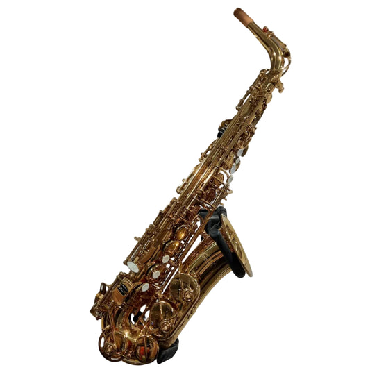 Gold saxophone on a white background