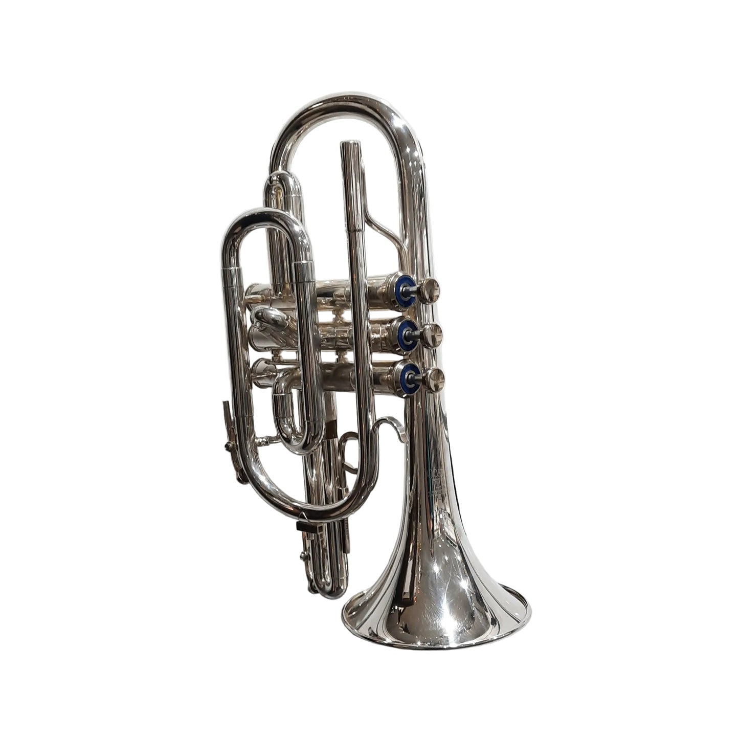 Silver trumpet on a white tiled wall