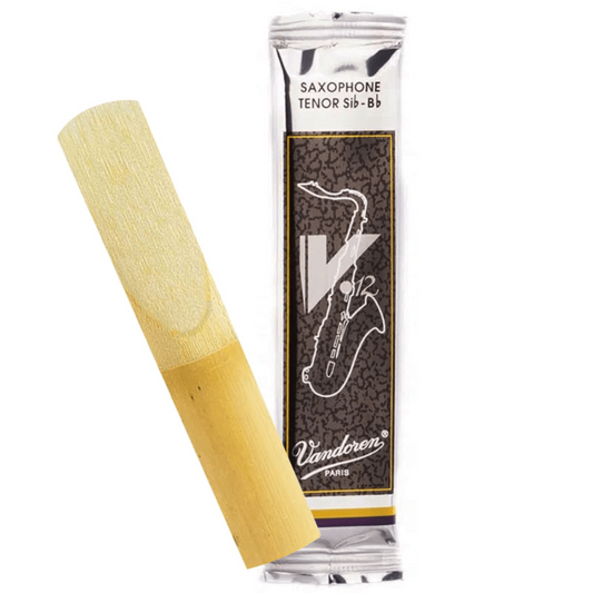 Saxophone tenor reed with Vandoren packaging on a white background