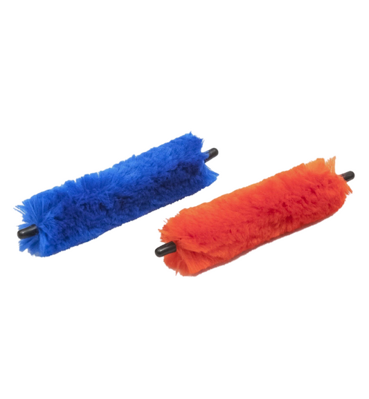 Three colorful mouthpiece pads on a white background