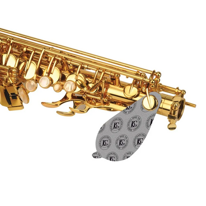 Gold saxophone on a white background