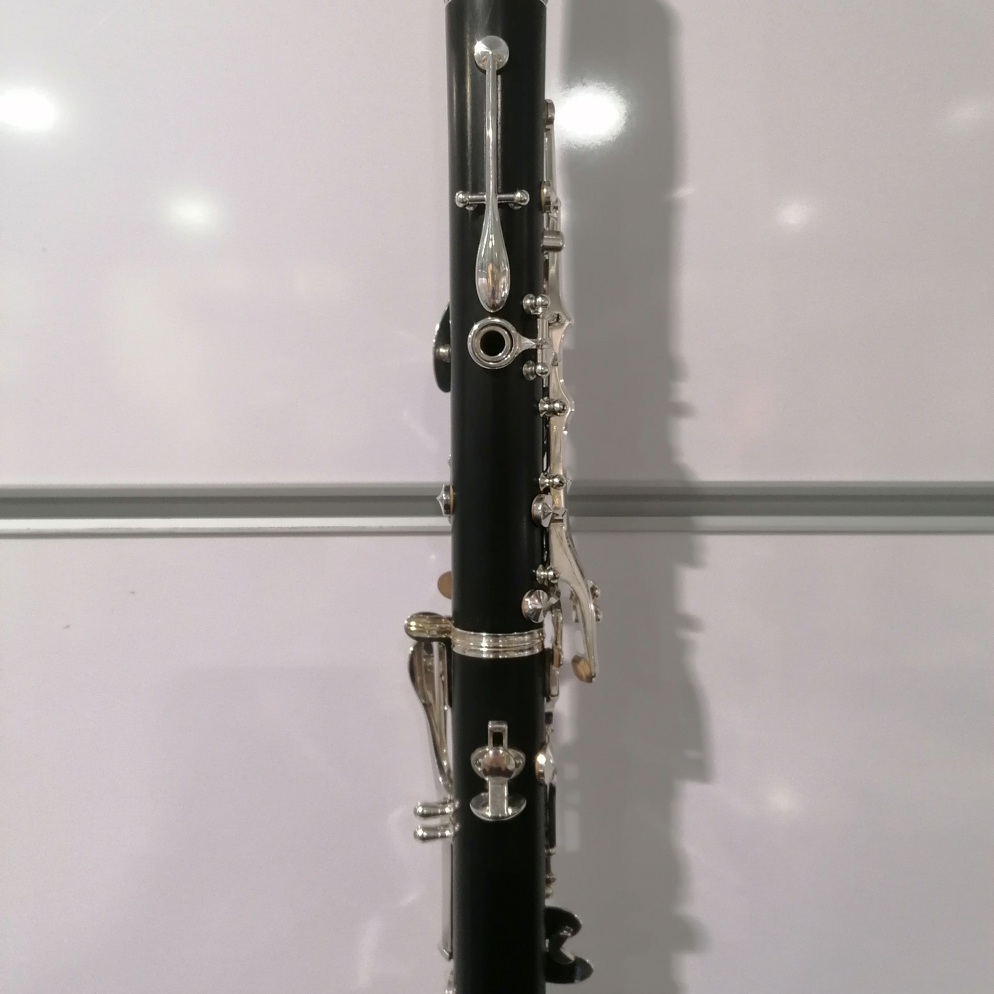 Clarinet against a white background