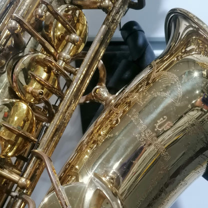 Close-up of a gold saxophone with intricate details