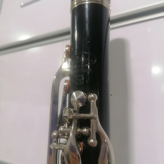 Close-up of a clarinet on a white background