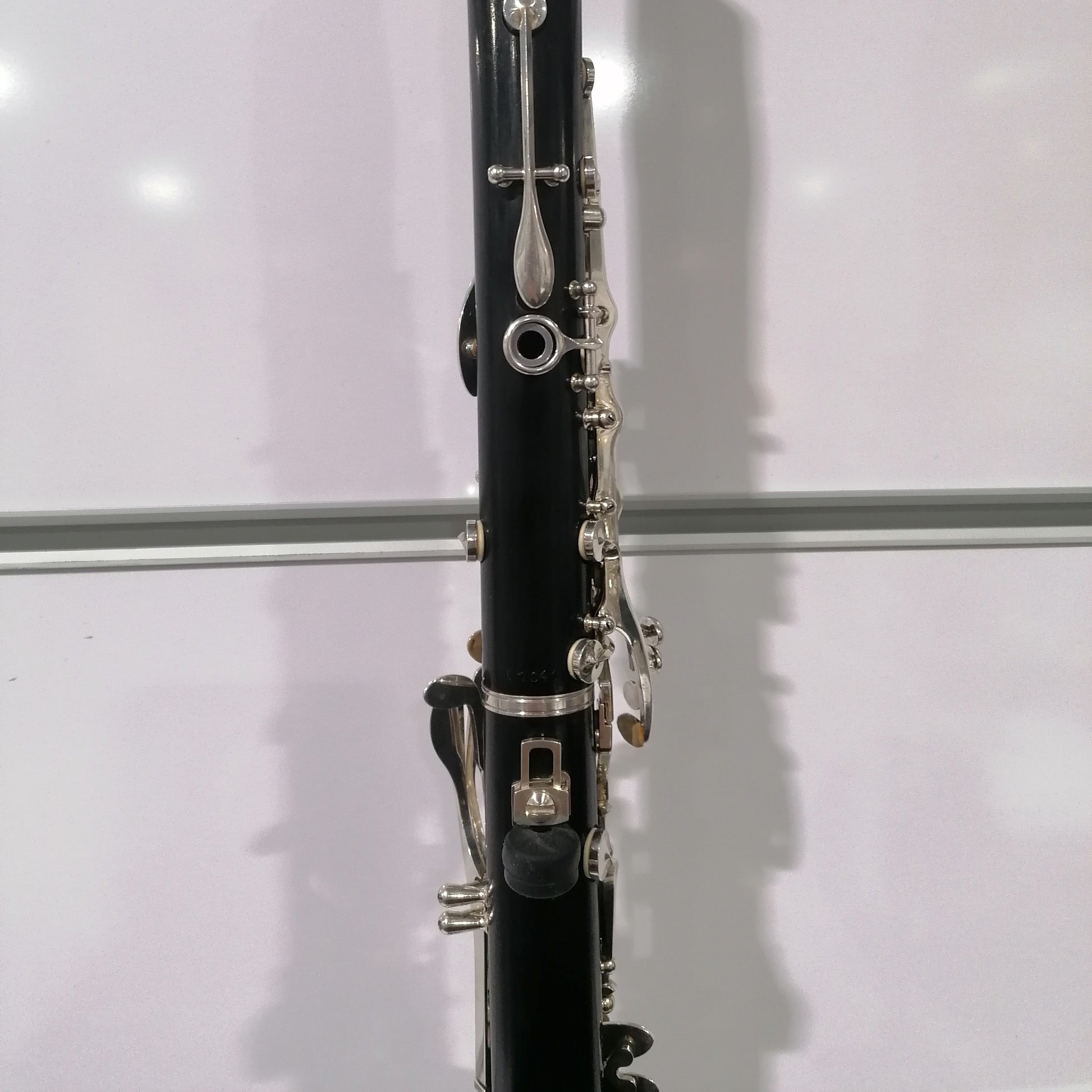 Black clarinet on a white background